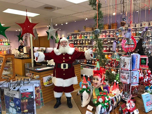 Santa loves the candy store!